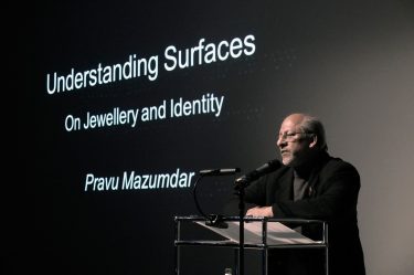 Pravu Mazumdar at the lectern in the Ernst-von-Siemens-Auditorium.